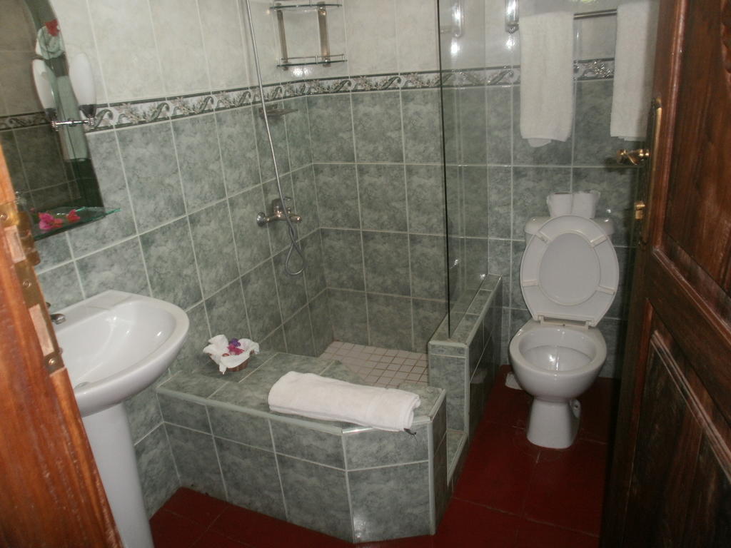 Asmini Palace Hotel Zanzibar Стая снимка