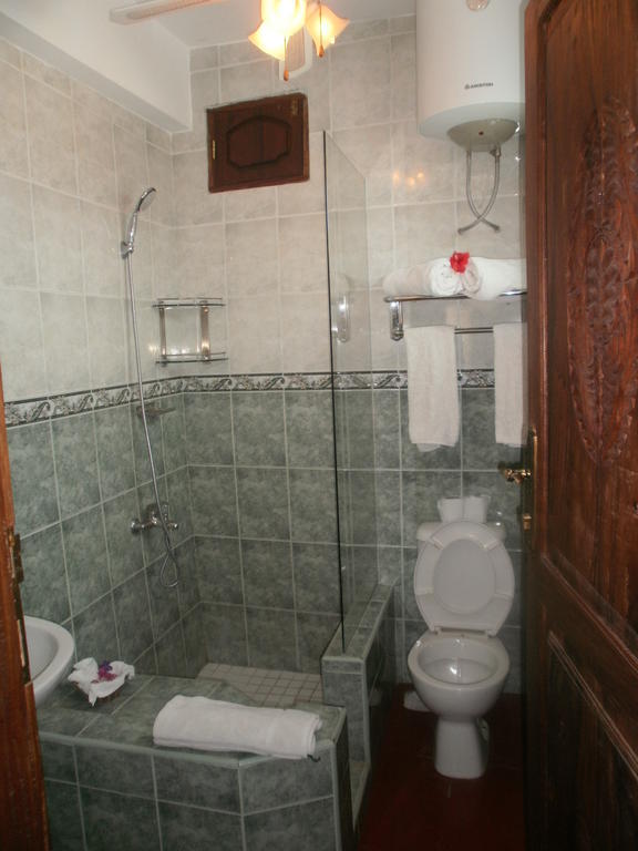 Asmini Palace Hotel Zanzibar Стая снимка
